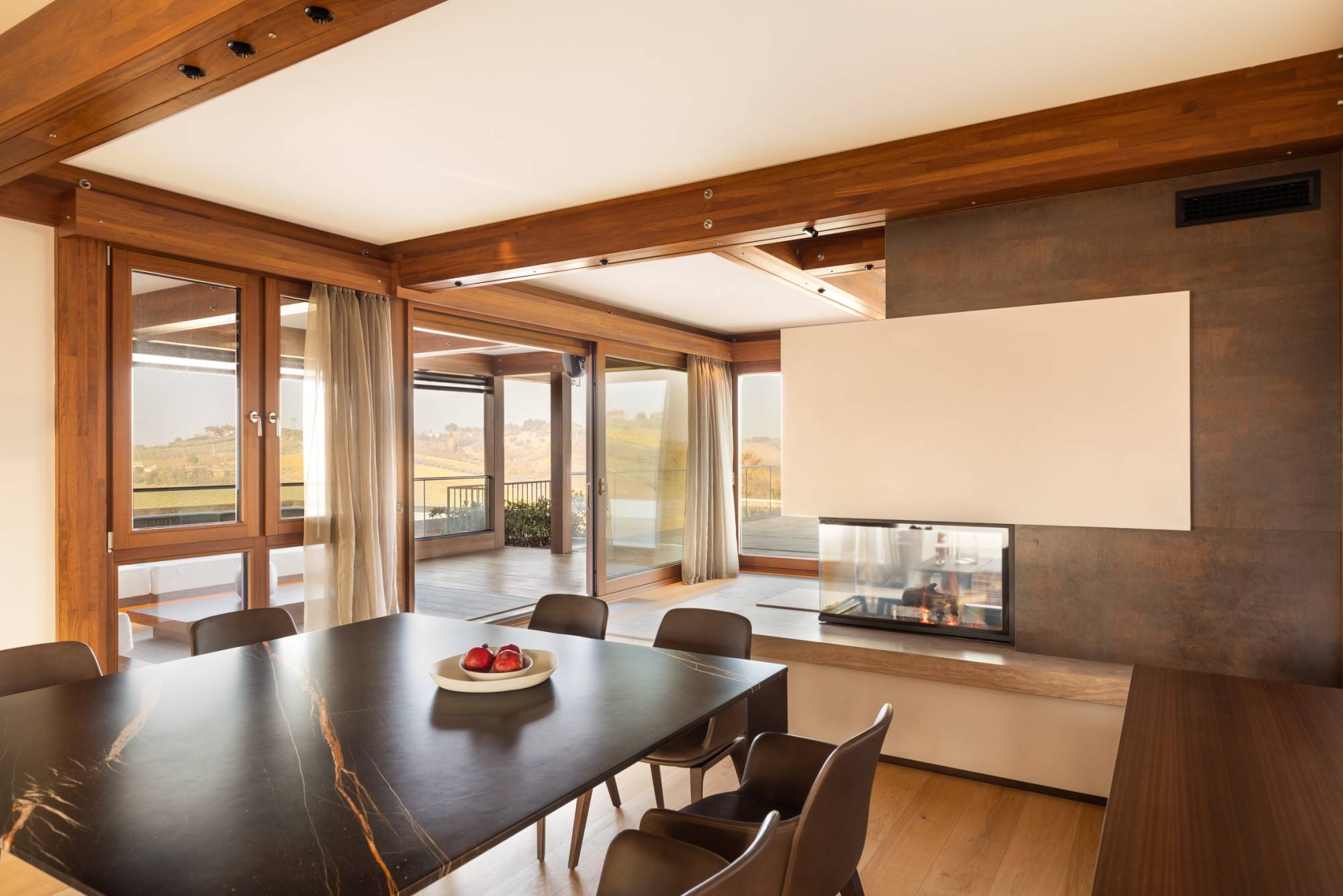 Pagano-house-wood-luxury-villa-rachele-dining-fireplace-view