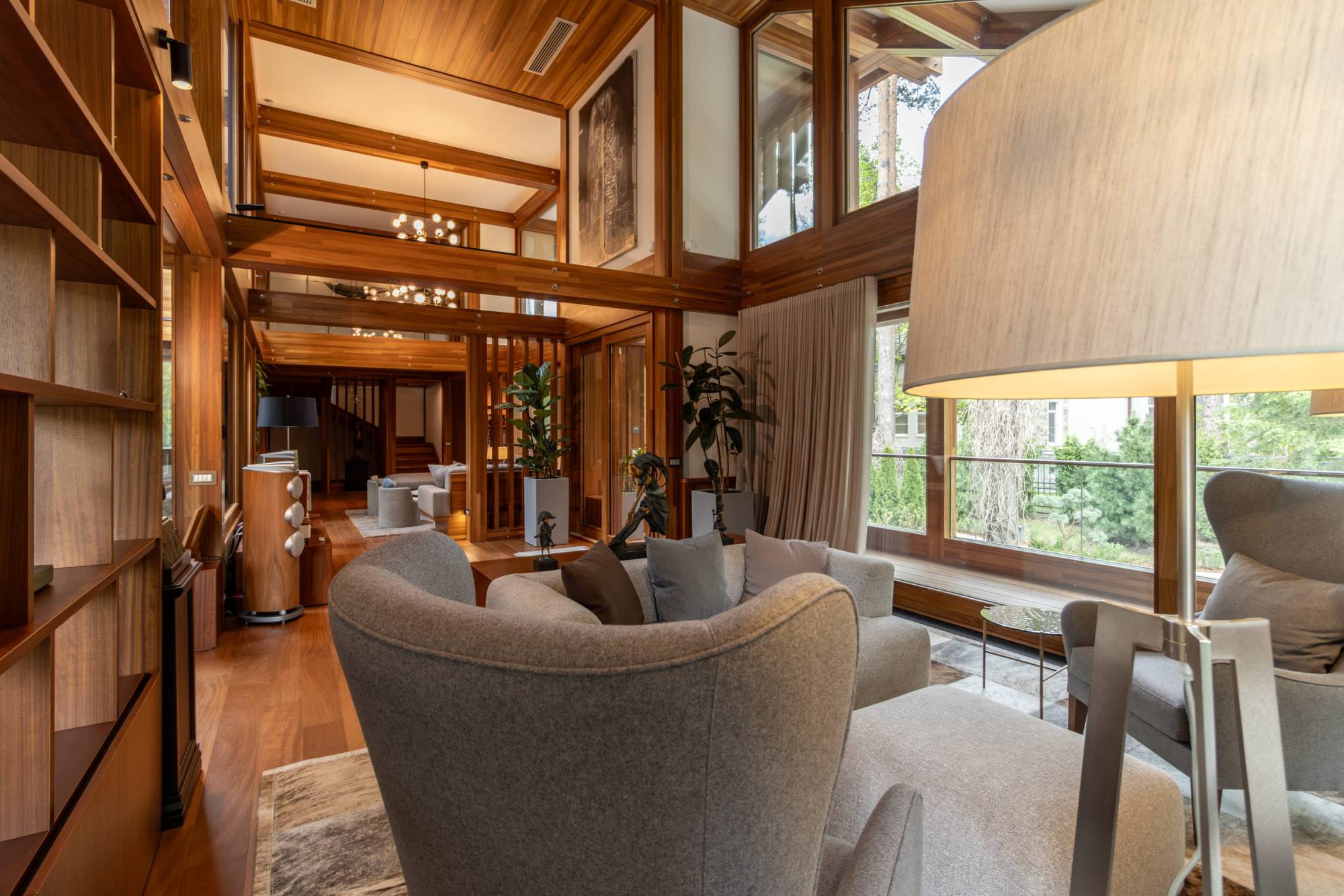 Pagano-house-wood-luxury-villa-boschi-living-bookshelves-doubleheight