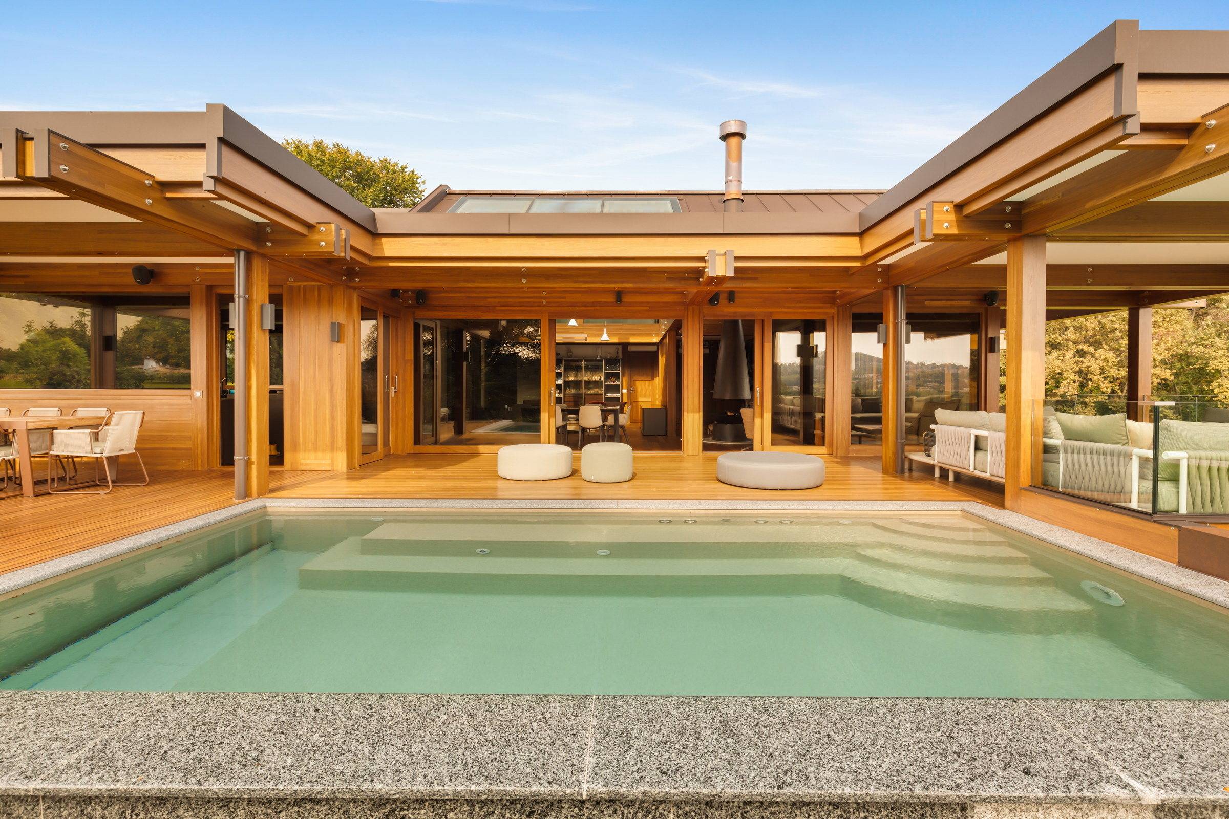 Pagano-house-wood-luxury-villa-varese-pool-glass-interior